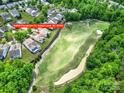 An aerial view shows the home's proximity to the golf course and neighborhood amenities at 54053 Flycatchers Ct, Fort Mill, SC 29707