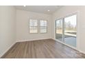 Cozy living area features sliding doors to a patio and neutral finishes, perfect for relaxing or entertaining at 1342 31St St, Conover, NC 28613