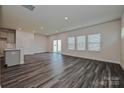 Bright, open-concept living room with plank floors and ample natural light at 1350 31St St, Conover, NC 28613