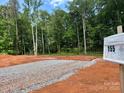 Image of a residential lot cleared and prepped for building with a sign posted at 155 Putney Ct, Salisbury, NC 28147