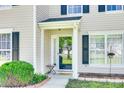 Close-up of the inviting front entrance, framed by lush greenery and attractive architectural details at 1605 Tate Rd # 258, Rock Hill, SC 29732