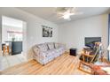 Cozy living room featuring hardwood floors, a ceiling fan, and plenty of natural light at 1605 Tate Rd # 258, Rock Hill, SC 29732