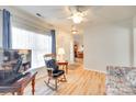 Bright living area with a large window, hardwood floors, and an open doorway at 1605 Tate Rd # 258, Rock Hill, SC 29732
