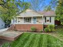 Beautifully maintained home with a classic front porch and well-kept front yard at 1631 Amanda Ln, Rock Hill, SC 29730