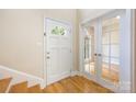 Bright foyer featuring hardwood floors and decorative white doors leading to other rooms at 4790 Cascade Ave, Rock Hill, SC 29732