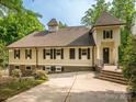 Charming home featuring light siding, dark shutters, and inviting curb appeal at 7324 Leharne Dr, Charlotte, NC 28270