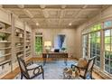Charming office with coffered ceilings, custom built-ins, and large windows for natural light at 1009 Seminole Dr, Waxhaw, NC 28173