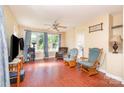 Bright living room boasts hardwood floors, natural light, and cozy rocking chairs, perfect for relaxing at 124 10Th Sw St, Conover, NC 28613