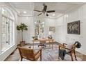 Bright office with coffered ceilings, paneled walls, large windows, and stylish decor at 1504 Alydar Ct, Waxhaw, NC 28173