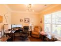 Comfortable home office featuring a large window, a neutral paint scheme and multiple seating options at 217 Hydrangea Dr, Clover, SC 29710