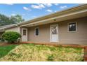 Tan siding home with a covered front porch and a tidy front lawn at 505 2Nd Street Ne Pl # B2, Conover, NC 28613