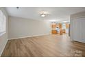 Spacious living room open to the kitchen, featuring modern flooring and neutral paint at 505 2Nd Street Ne Pl # B2, Conover, NC 28613