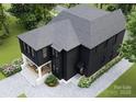 Rear exterior aerial featuring a home with a rear porch, patio, and dark exterior paint at 1115 West Blvd, Charlotte, NC 28208