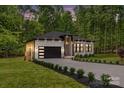 Beautiful brick home boasting a modern garage, lush lawn, and well-maintained landscaping at 1534 Easy St, Belmont, NC 28012