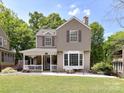 Charming two-story home boasts a well-maintained lawn and inviting front porch at 2804 Park Rd, Charlotte, NC 28209