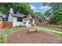 Beautiful house with a newly landscaped lawn and inviting front porch at 624 Oakland Ave, Charlotte, NC 28204