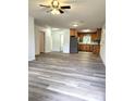 Inviting living room featuring modern flooring and an open floor plan to the kitchen at 11 N 10Th Ave, Maiden, NC 28650
