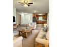 Inviting living room open to kitchen featuring modern flooring and an open floor plan at 11 N 10Th Ave, Maiden, NC 28650