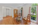 Cozy living room features hardwood floors, natural light, and classic furnishings at 111 Wilton Pl, Mooresville, NC 28117