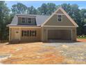 Charming new construction home with a two car garage and inviting front porch at 28770 Hwy 73 Hwy, Albemarle, NC 28001