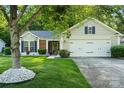 Attractive single-Gathering home with lush green lawn and 2 car garage at 3604 Braefield Dr, Indian Trail, NC 28079
