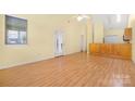Bright living room with hardwood floors, lots of natural light, and neutral paint at 3951 Jasmine Ln, Denver, NC 28037