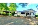 Charming single story home with a covered front porch and an attached carport at 16603 Nc Hwy 73 Hwy, Albemarle, NC 28001