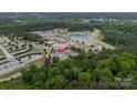 An aerial shot of the Whitewater Center and surrounding woods at 3205 Berry Creek Rd, Charlotte, NC 28214