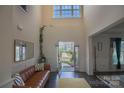 Bright entryway showcasing hardwood floors, modern decor, and a welcoming ambiance at 9586 Kartey Nw Ave, Concord, NC 28027