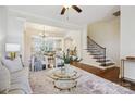 Open-concept living space with seamless flow to the kitchen and dining area at 258 Iverson Way, Charlotte, NC 28203