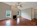 Bright living room featuring fireplace and hardwood floors at 5075 Meanna Dr, Clover, SC 29710