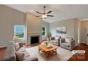 Bright living room featuring fireplace, hardwood floors, and neutral decor at 5075 Meanna Dr, Clover, SC 29710