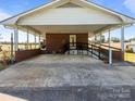 Spacious carport with ample parking and ramp access to the house at 1160 Redmon Rd, Cleveland, NC 27013
