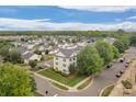 Aerial view showcases the neighborhood's layout, mature trees, and well-maintained homes at 4072 Town Center Rd, Harrisburg, NC 28075