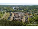 Panoramic aerial view of a community near a lake, highlighting the neighborhood's layout, natural surroundings and prime location at 6642 Star Dr, Sherrills Ford, NC 28673