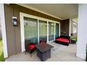 Comfortable back porch with outdoor seating area, perfect for enjoying the outdoors, features a sliding door and ample light at 6642 Star Dr, Sherrills Ford, NC 28673