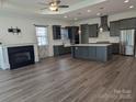 Open-concept kitchen and living room with island, stainless steel appliances and fireplace at 6642 Star Dr, Sherrills Ford, NC 28673