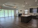 Spacious living room featuring a fireplace, a large island and lots of natural light at 6642 Star Dr, Sherrills Ford, NC 28673