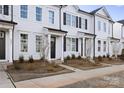Desirable new construction townhomes with black doors and black window frames at 8118 Jacey Ln # 20, Huntersville, NC 28078