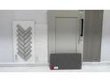 A curated selection of interior design materials that includes tile and cabinet samples at 149 Glenn Dr, Mooresville, NC 28115