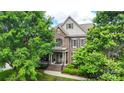 Gorgeous home featuring stone and brick facade, well-maintained landscaping, and inviting curb appeal at 2817 Bevis Ln, Waxhaw, NC 28173