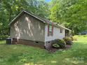 Exterior view features siding, manicured shrubs, and well maintained lawn at 4225 Stewart Rd, Claremont, NC 28610