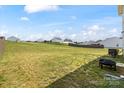 Expansive grassy backyard offering ample space for recreation and outdoor activities, perfect for relaxation and entertainment at 1270 Winding Creek Rd, Salisbury, NC 28146