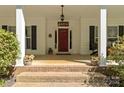 Inviting front porch with brick steps and ample space for seating and decor at 1956 Forest Ridge Dr, Stanley, NC 28164