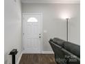 Bright entryway featuring wood-look floors and a classic white front door at 3015 Great Falls Hwy, Chester, SC 29014