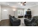 Cozy living room with a fireplace and large windows for natural light at 3015 Great Falls Hwy, Chester, SC 29014