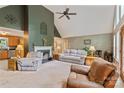 Spacious living room features high ceilings, fireplace and neutral paint colors at 4038 Forest Brook Dr, Edgemoor, SC 29712