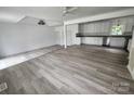 Spacious living room with updated flooring and modern gray and white paint at 409 S Martin Luther King Jr Ave, Salisbury, NC 28144