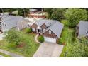 Beautiful home featuring a landscaped yard, patio, and two car garage at 5706 Sustar Dr, Monroe, NC 28110