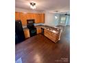 This kitchen boasts stainless steel appliances, ample cabinetry, and a convenient layout at 10649 Trolley Run Dr, Cornelius, NC 28031